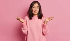 life-perception-hard-decision-concept-puzzled-clueless-young-asian-woman-spreads-palms-poses-uncertian-indoor-expresses-doubt-wears-knitted-sweater